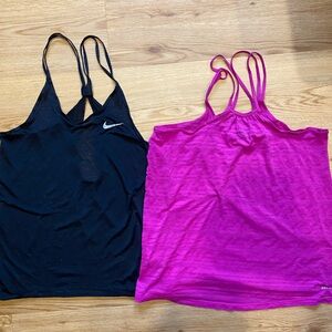 Two Nike Drift Tank Tops